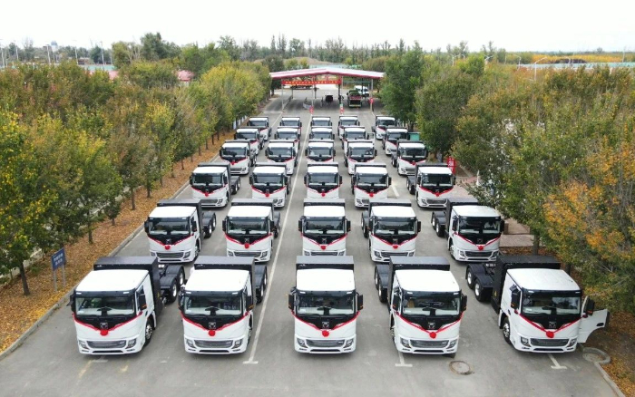 脱碳“换”绿进行时！冰球突破mg新能源重卡批量交付西北